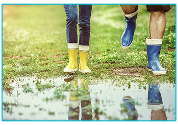 Rainy day activities for your caravan holiday - get out for a walk in wellies
