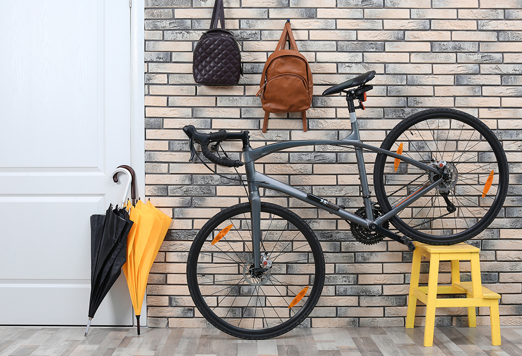 A bike on a wall rack as a storage idea 