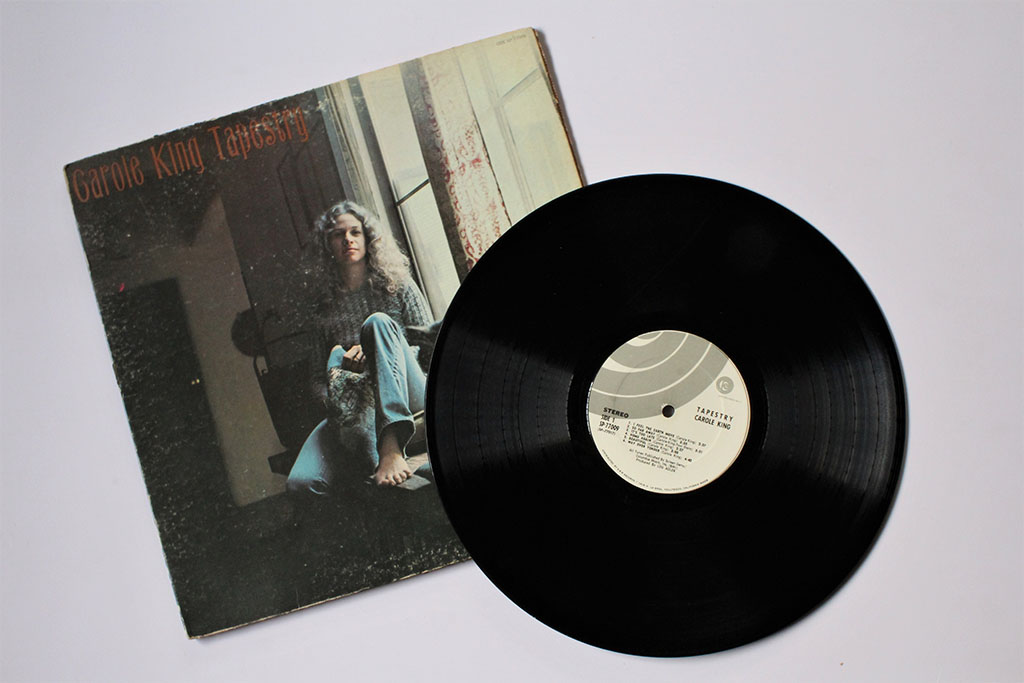 Miami, Fl, USA: Feb 19, 2021: Soft rock and pop artist, Carole King music album on vinyl record LP disc. Titled: Tapestry album cover