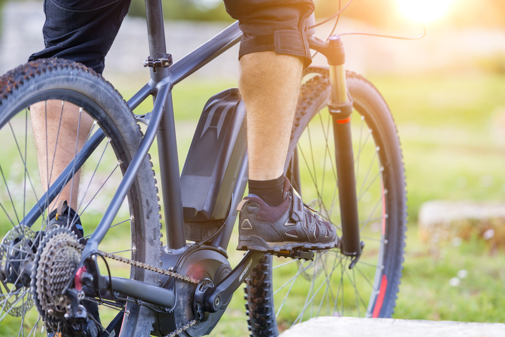 Man riding an electric bike.