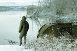 Winter Carp Fishing On Lake.