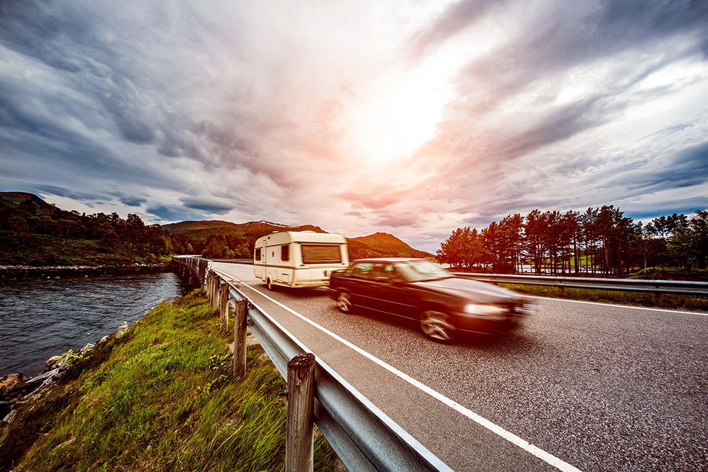 Car Towing Caravan On Holiday