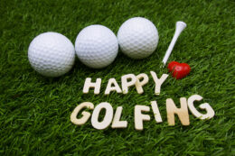 Golf jokes happy golfing playful title on grass background.